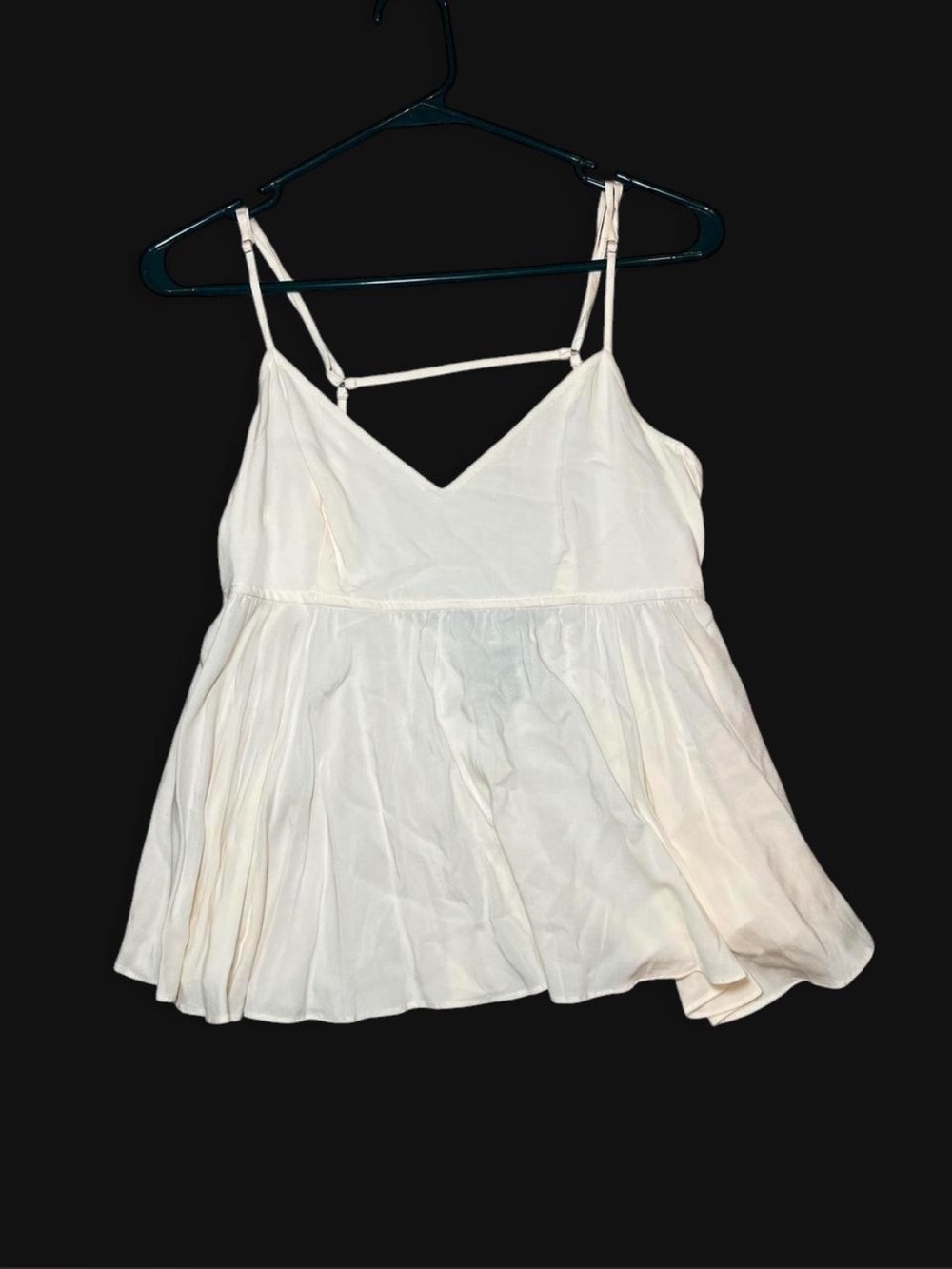 Cream flowy peplum tank top